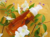 Huile de soleil teintée au Monoï