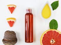 Huile de massage aux huiles essentielles minceur