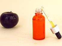 Huile de soin pailletée pour le décolleté