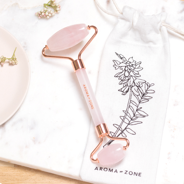 Roller visage quartz rose avec pochette en coton Roller visage quartz rose avec pochette en coton